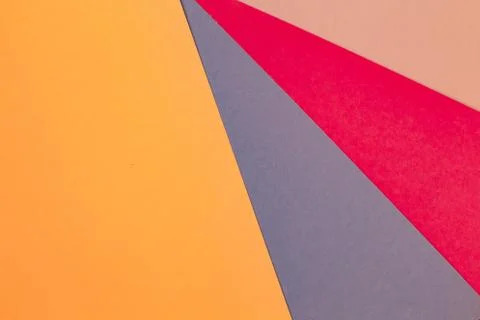 Sheets of colored paper. Many colored sheets of paper are laid out in the har Stock Photos