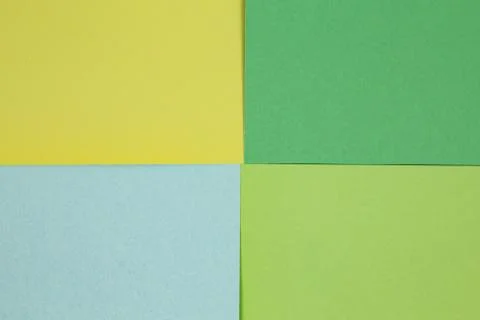 Sheets of colored paper. Many colored sheets of paper are laid out in the har Stock Photos