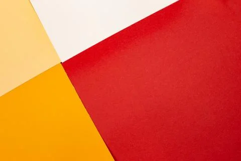 Sheets of colored paper. Many colored sheets of paper are laid out in the har Stock Photos
