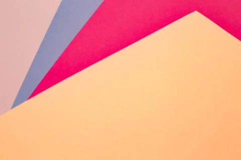 Sheets of colored paper. Many colored sheets of paper are laid out in the har Stock Photos