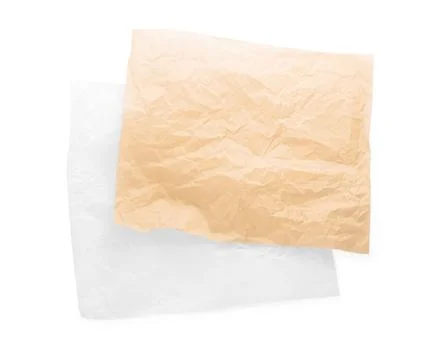 Sheets of crumpled baking paper on white background, top view Stock Photos