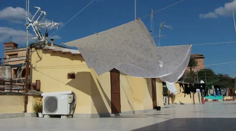 Sheets drying on a Roman Roof Stock Footage 36417855