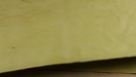 Sheets of eco recycled material are laid one on top of another. Stock-Footage 329735584