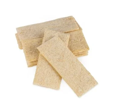 Sheets of farro on white. Stock Photos