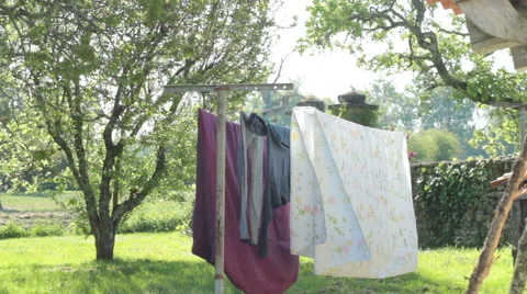 Sheets fly in the countryside Stock-Footage 43664697