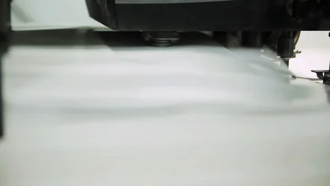 Sheets of paper. Big black printing machine working in modern printing house Stock Footage 98561172