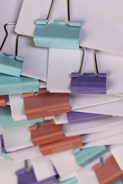 Sheets of paper for documents are joined together, the sheets of paper is d.. Stock Photos