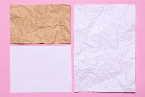 Sheets of paper on a pink background. Texture of crumpled paper Stock Photos