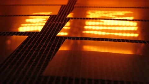 Sheets of plastic move along the conveyor of an infrared dryer. Stock Footage 130651082