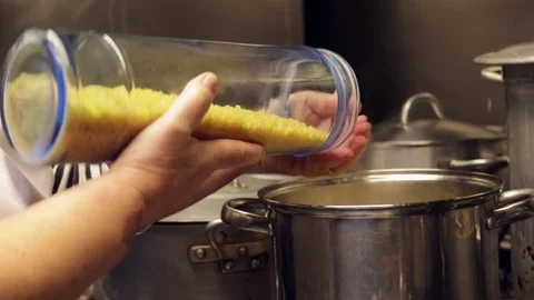 Shef pouring pasta. Stock Footage 72976698
