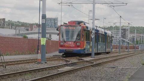 Sheffield Tram Arriving Reverse angle Stock Footage 102386629