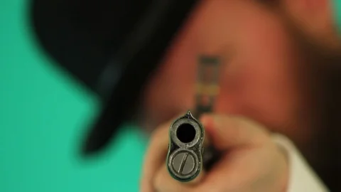 Sheiff aims through Winchester sight, muzzle close up Stock Footage 94001377