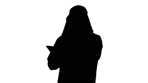 Sheikh presenting information or product using digital tablet, Alpha Channel Stock Footage 141322044
