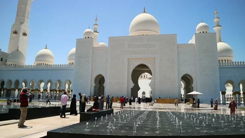 Sheikh Zayed Grand Mosque Courtyard with Tourists, Domes, Minarets and Stock Footage 335300417