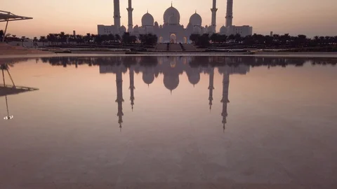 Sheikh Zayed Grand Mosque reflected on the water in Abu Dhabi emirate of Unit Stock Footage 121222201