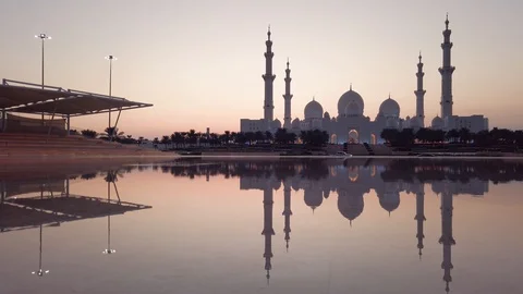 Sheikh Zayed Grand Mosque reflected on the water in Abu Dhabi emirate of Unit Video stock 121222360