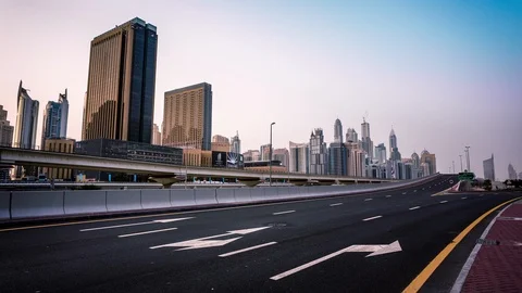 Sheikh Zayed Rd Highway &amp; Dubai Metro along Jumeirah Beach Residence time lapse Stock Footage 118862698