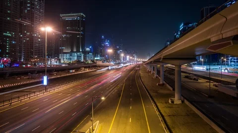 Sheikh Zayed Rd Highway &amp; Dubai Metro along Jumeirah Beach Residence time lapse Stock-Footage 118863639