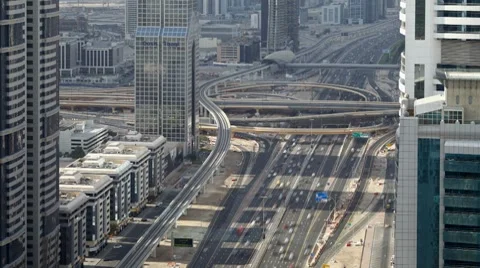 Sheikh Zayed Rd, traffic and new high rise buildings along Dubai's main road Video stock 7735732