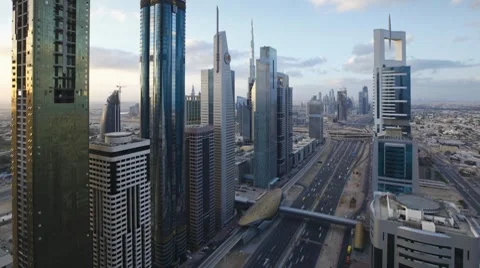 Sheikh Zayed Rd, traffic and new high rise buildings along Dubai's main road Stock Footage 7735959
