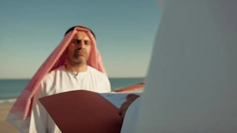 Sheiks Planning The Project From The Document Paper Stock Footage 277167388