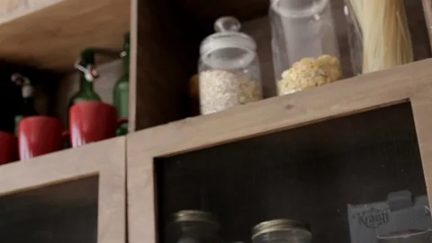 On the shelf are vessels with cereals Stock Footage 101818434