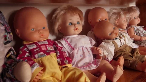 Shelf with dolls to play with 4k Stock Footage 77438032