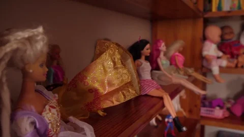 Shelf with dolls to play with 4k Stock Footage 77438400