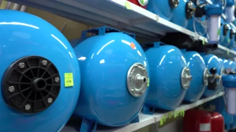 Shelf with hydroaccumulators in the store. Stock Footage 143003673