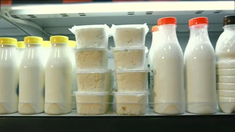 Shelf with milk in the store Stock Footage 143753228