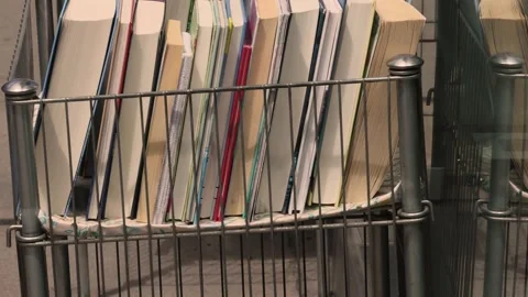 A shelf of second-hand books. Stock Footage 285144496
