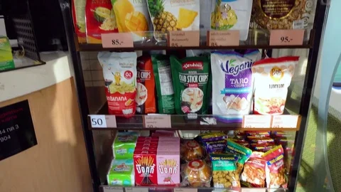 Shelf of snacks in dining car inside train Stock Footage 83080040