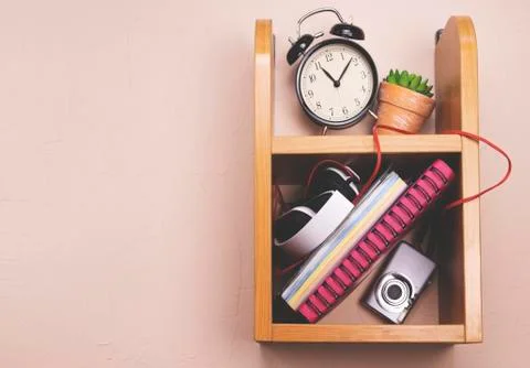 Shelf on the wall with different things. Stock Photos