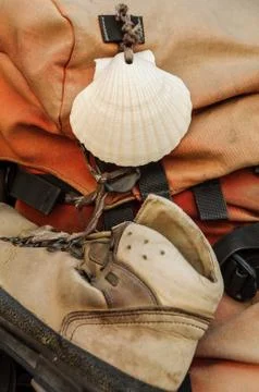 Shell and shoe on a backpak Stock-Fotos