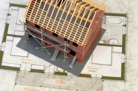 Shell construction, model and blue print, symbolic picture for building a hou Stock Photos