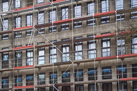 Shell construction with scaffolding of a large new building Stock Photos