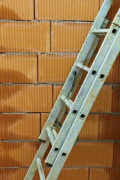 The shell of a detached house in solid brick construction. Building site for Stockfoto's