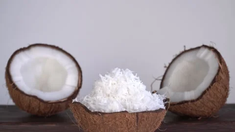 Shell filled with coconut shavings. 스톡 동영상 154931563