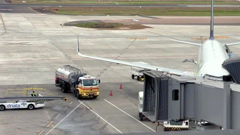 Shell fuel truck servicing airplane at Porto Alegre airport gate Видео 339067798