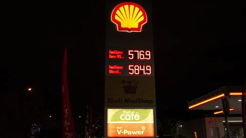 Shell Gas Price Sign by the Road at Night in Budapest, Hungary. Stock Footage 320167055