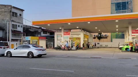 Shell gas station in evening at Teluk Intan,  Shell V-power fuel station. Stock Footage 302569667