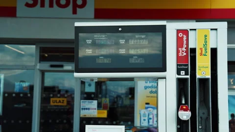 Shell gas station fuel pump with digital display and V-Power branding Stock Footage 328572776