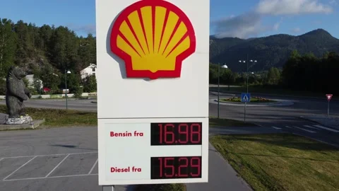 Shell gas station in Norway - closeup ascending aerial of billboard Stock Footage 165644650