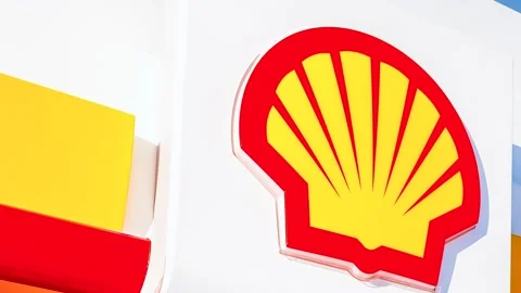 Shell gas station signboard against the blue sky Stock Footage 166604474