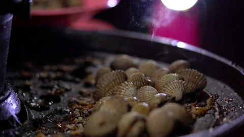Shell grilling on hot pan for cooking Video stock 152867001