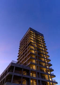 A shell of a high-rise building as it begins to get dark, jena. Germany Stock Photos
