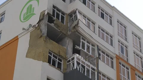 Shell hit residential building in Kyiv, Ukraine Stock Footage 260738210