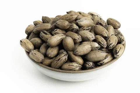 In-shell Pecan Nuts On Bowl Stock Photos