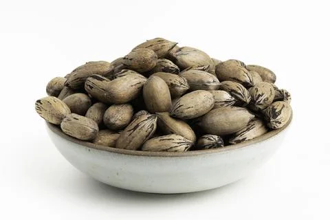 In-shell Pecan Nuts On Bowl Stock Photos