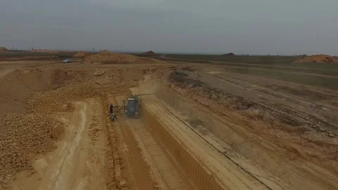 Shell quarry quarry. Cutting a seashell into blocks right away in quarry. Stock Footage 239262769
